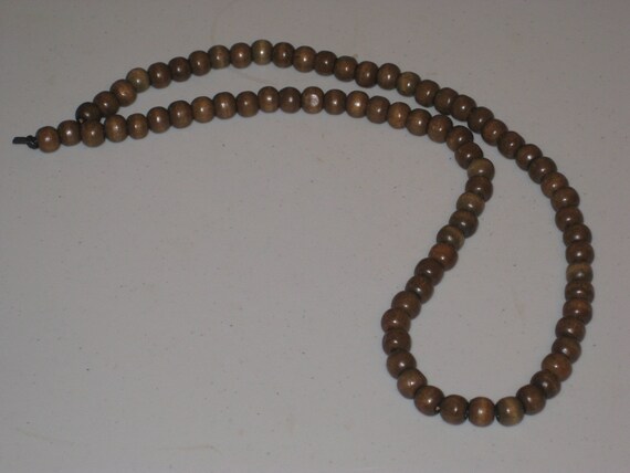 Dark brown wood bead surfer necklace, hand made.