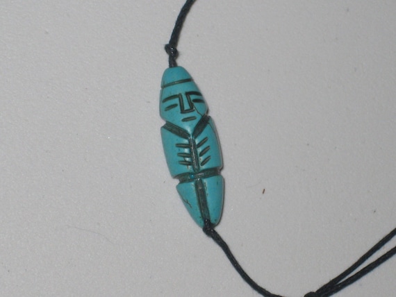 Hand carved tibetan payer bead amulet, necklace is adjustable up to 32" long.