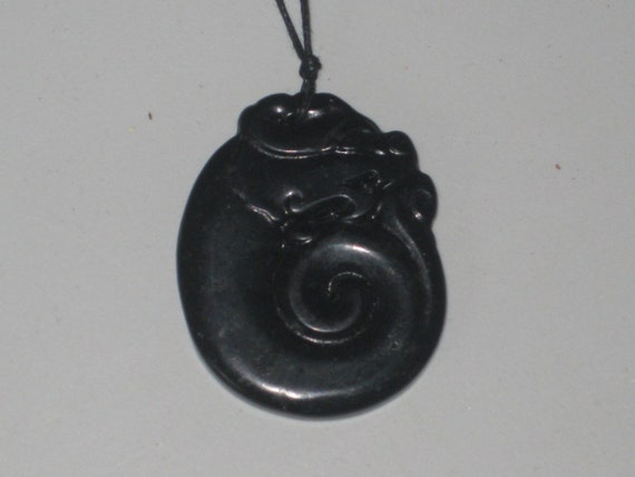 Hand carved black and green jade dragon pendant, with adjustable necklace.