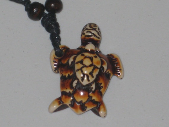 Surfers sea turtle with baby necklace, adjustable up to 32" long.