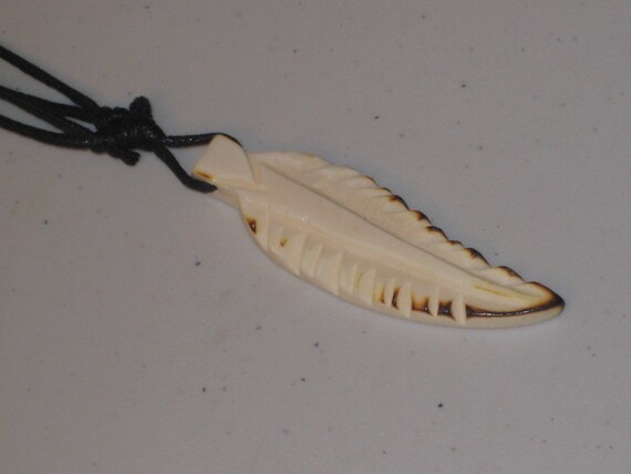 Hand carved Buffalo bone leaf.