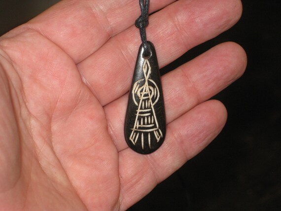 Buffalo bone African tribal, hand carved pendant.