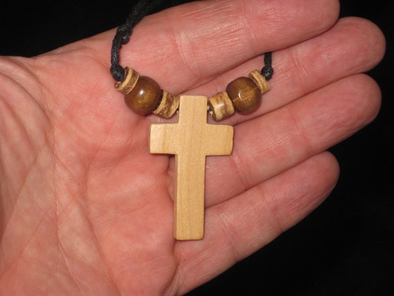 Hand carved wood cross pendant, with adjustable necklace.