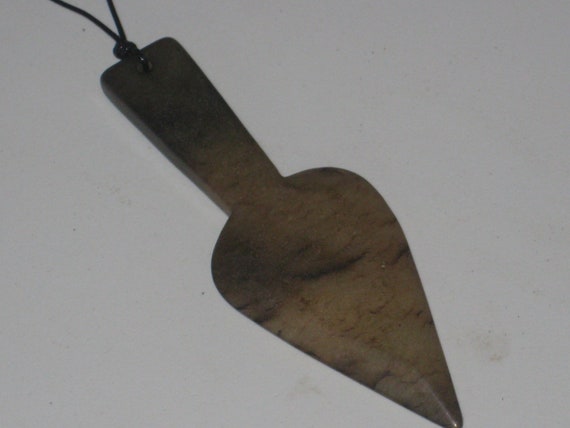 All natural hand carved two sided very old Jade stone arrow head pendant.