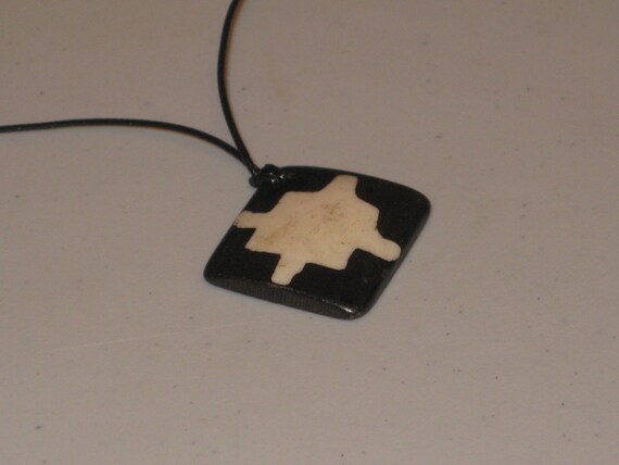 Hand carved primitive African design pendant, Buffalo bone.