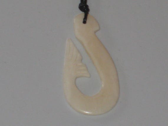 Hand carved bone fish hook pendant, with adjustable necklace.