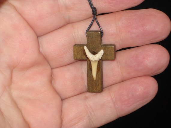 Hand carved wood cross with fossil shark tooth from Morocco, with adjustable necklace.