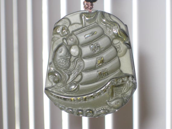 Hand carved Ice Obsidian Sail boat pendant, with glass bead necklace.