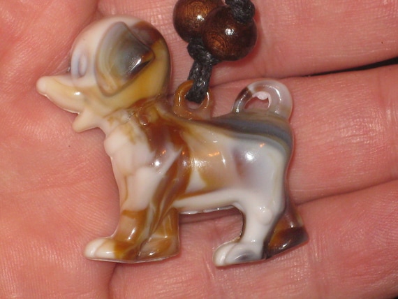 Surfers Butterscotch puppy necklace, adjustable up to 32" long.