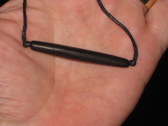 Buffalo bone hand carved piping pendant, with adjustable necklace.
