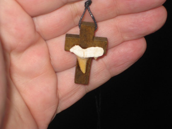 Hand carved wood cross with fossil shark tooth from Morocco, with adjustable necklace.