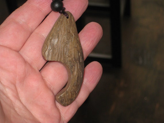 Hand carved Sandalwood pendant, with adjustable necklace.