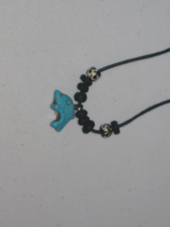 Turquois surfer Dolphin pendant, with adjustable necklace.