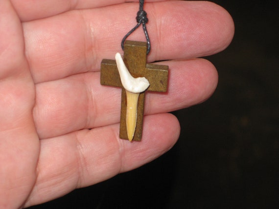 Hand carved wood cross with fossil shark tooth from Morocco, with adjustable necklace.
