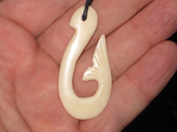 Buffalo bone Maori warrior tribal hand carved pendant.