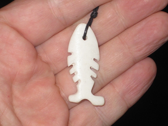 Ox bone fish skeleton, hand carved pendant.