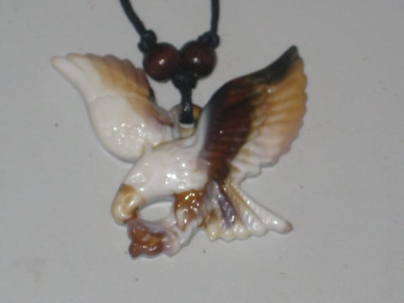 Surfers bald eagle necklace, adjustable up to 32" long.