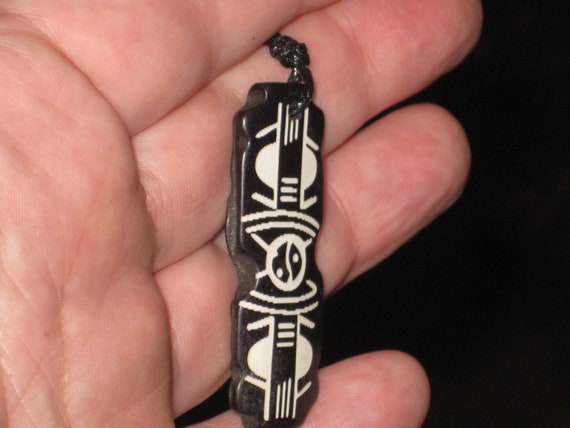 Hand carved ox bone Ying Yang pendant with adjustable necklace.