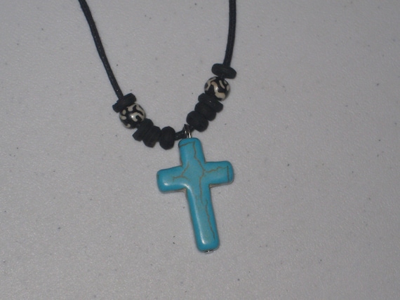 Turquois surfer cross pendant, with adjustable necklace.