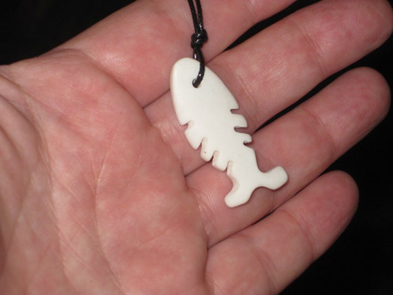 Buffalo bone fish pendant, with adjustable necklace.