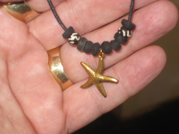 Star fish pendant, with adjustable necklace.