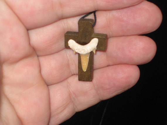 Hand carved wood cross with fossil shark tooth from Morocco, with adjustable necklace.