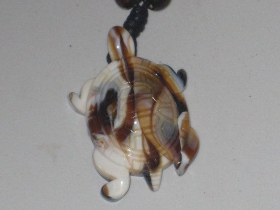 Surfers Butterscotch turtle necklace, adjustable up to 32" long.