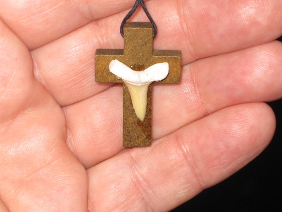 Hand carved wood cross with fossil shark tooth from Morocco, with adjustable necklace.