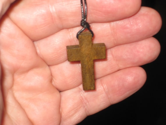 Hand carved wood cross pendant, with adjustable necklace.