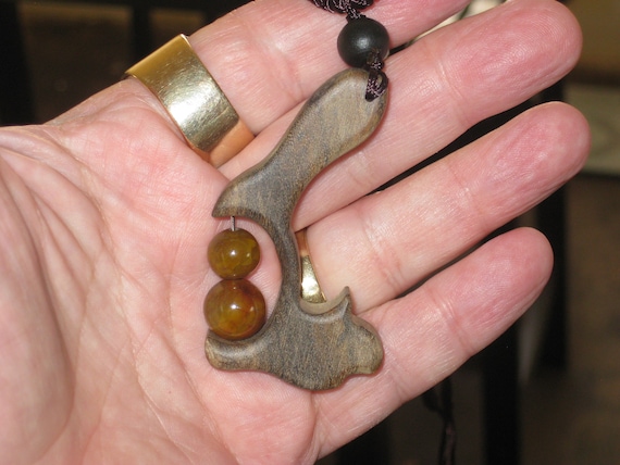 Hand carved Sandalwood pendant with stone beads and adjustable necklace.