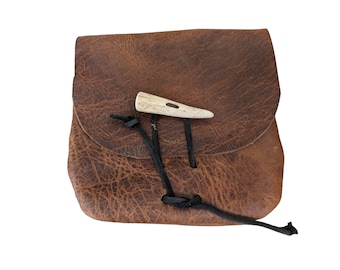 vintage hand made leather pouch with belt loop and adjustable antler point button / leather thong closure