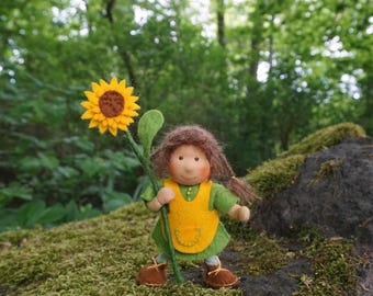 Kind mit Sonnenblume