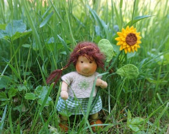 Kind mit Sonnenblume