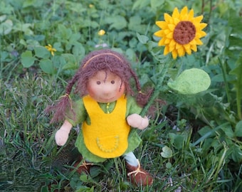 Kind mit Sonnenblume