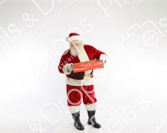May include: Santa Claus in a red suit and hat holding a Coca-Cola box. The box is red with white text. Santa is wearing a black belt with a gold buckle and black boots. The background is white.