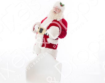 May include: Santa Claus in a red suit with white fur trim, a gold belt, and a white beard, stands near a white chair with wooden legs. He wears a hat with holly. The background is white.