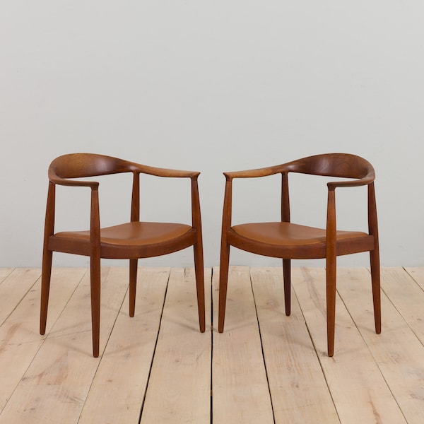 Pair of Hans Wegner "the chair" model 503 in teak and leather for Johannes Hansen, 1960s