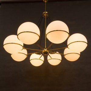 Italian brass chandelier with 8 large, opaline glass globes