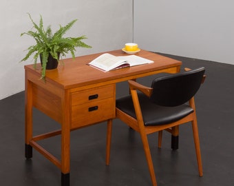 Small Danish teak mid century desk with black handles and feet by Nipu Mobler 1970s