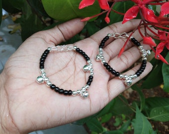 Silver baby bangles with shop black beads