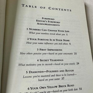 May include: Table of Contents page from a book titled "Numbers Can Change Your Life". The book explores the influence of numbers, names, and birth dates on a person's life. Chapters include "Your Fortune is in Your Name", "First Impressions", "Secret Yearnings", "Diamonds - Polished and Rough", and "Your Own Yellow Brick Road".