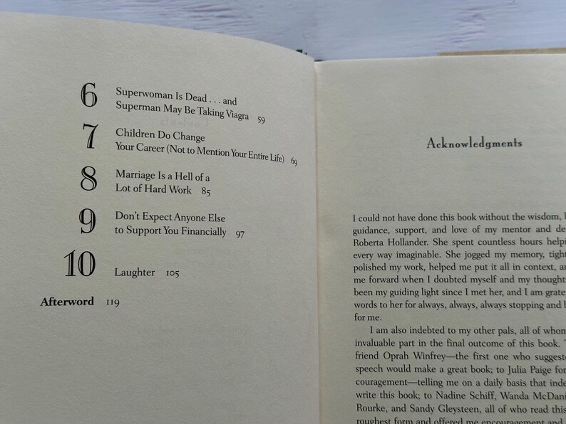 May include: Open book page with a table of contents and acknowledgments. The table of contents lists chapter titles such as "Superwoman Is Dead..." and "Marriage Is a Hell of a Lot of Hard Work."