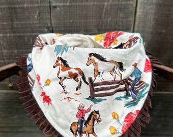 Buckaroo-babyslabbetje met bloemenprint cowgirl en paarden