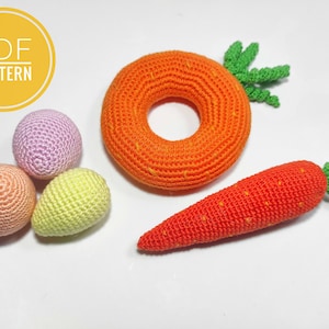 Puede incluir: Un conjunto de juguetes de crochet que incluye una zanahoria, un anillo y tres huevos en diferentes colores. Los juguetes est&aacute;n hechos con un hilo suave y texturizado y son perfectos para beb&eacute;s y ni&ntilde;os peque&ntilde;os.