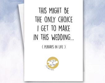 May include: A white card with black text that reads "This might be the only choice I get to make in this wedding... (Perhaps in life)". A gold sticker with the text "Will you be my best man?" is on the bottom right corner of the card.