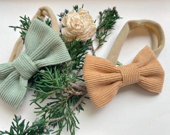 Diadema de pana con lazo para bebé: Talla única. Banda de nailon.