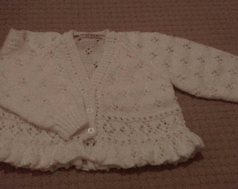 Beautiful lace effect white cardigan with peplum style bottom