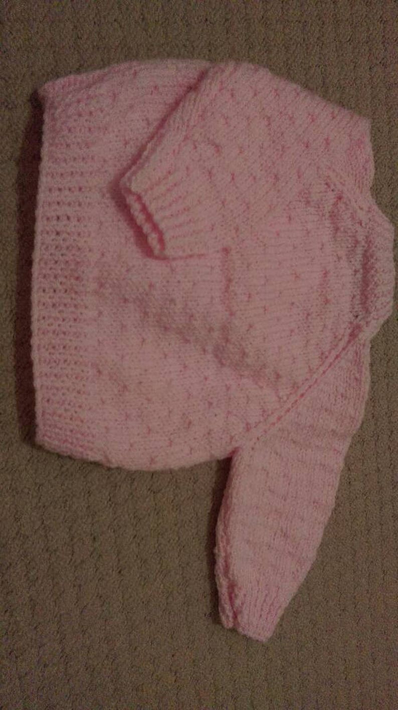 Pretty pink cardigan with diamond pattern and flower buttons image 2