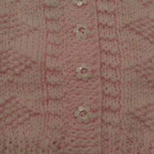 Pretty pink cardigan with diamond pattern and flower buttons image 3