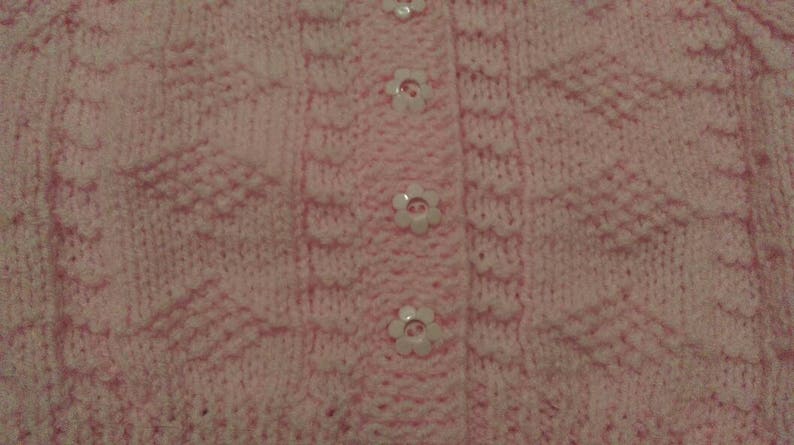 Pretty pink cardigan with diamond pattern and flower buttons image 3